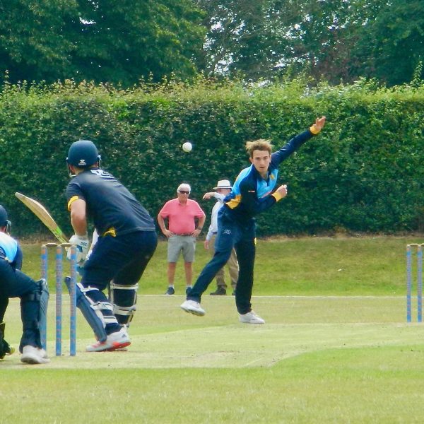 Charlie Home bowling against Norfolk