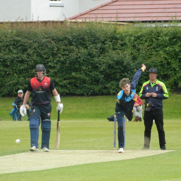 Jack Home bowling against Herefordshire at Whitchurch