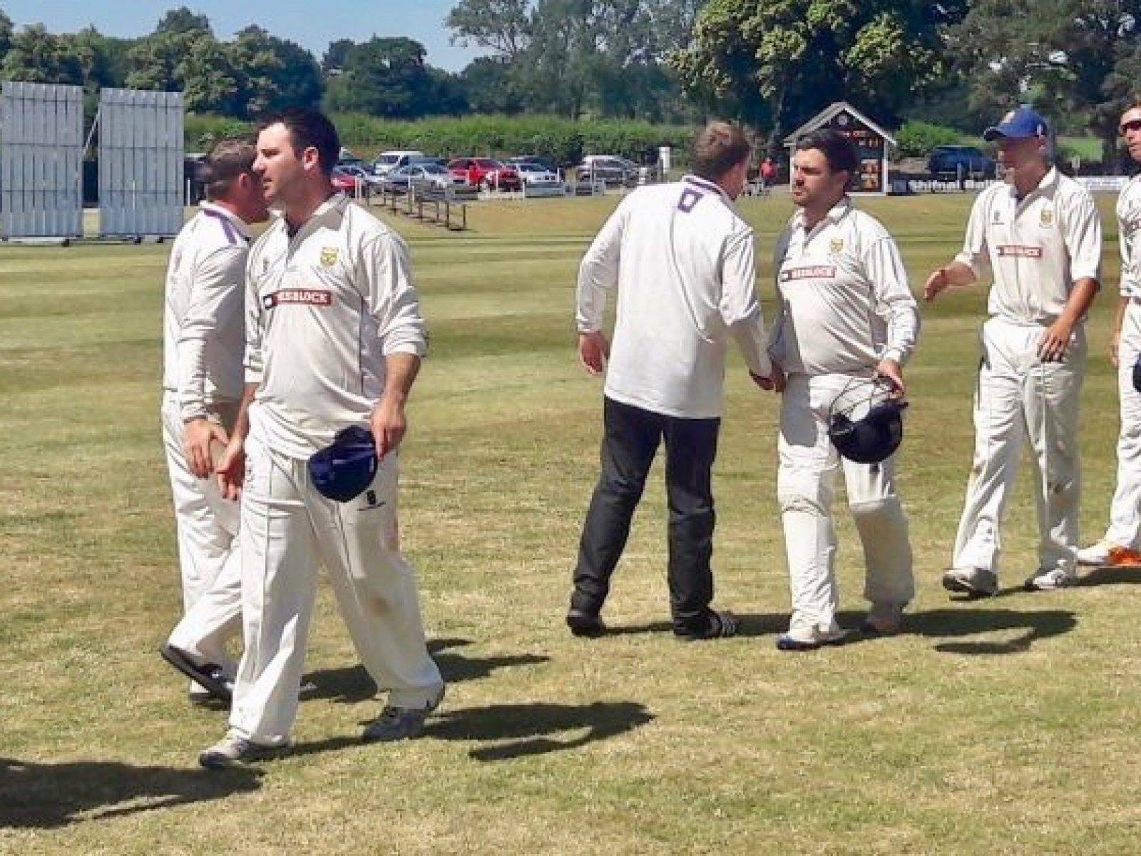 Steve-Leach-leads-the-Shropshire-players-off-the-field-after-beating-Cheshire-website-photo